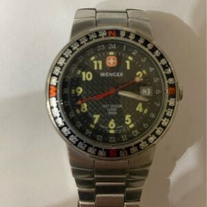 Wenger SMT stainless steel case and band. Carbon fiber design face.